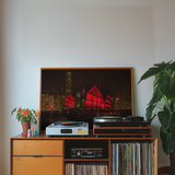 Historic Duk Ling red sail junk boat with Hong Kong skyline backdrop